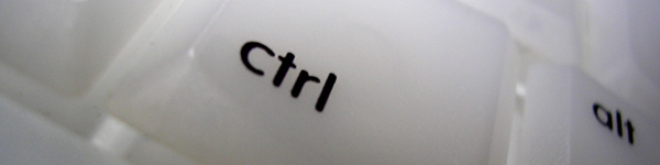 Close-up of a CTRL key on a translucent keyboard