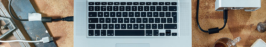 A laptop on a workshop table